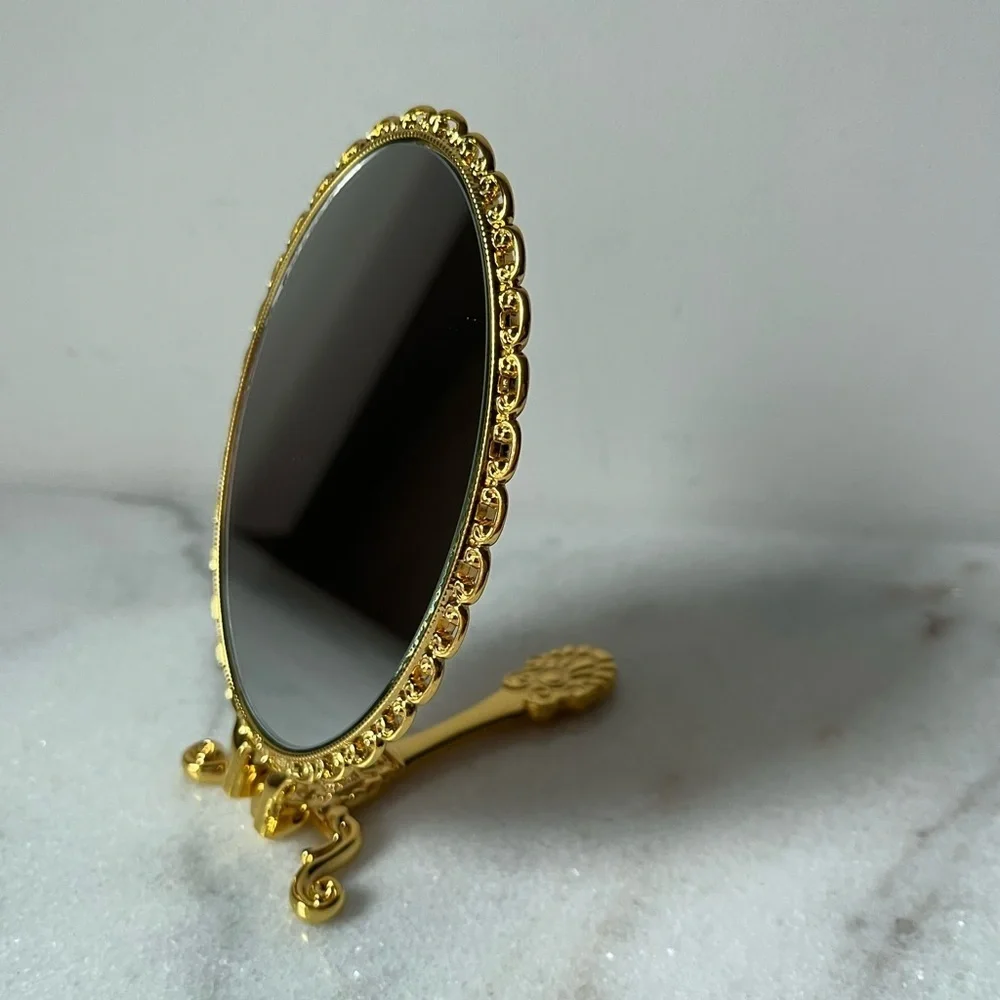 Izzy and Liv gold Fold Away Hand Mirror adjustable